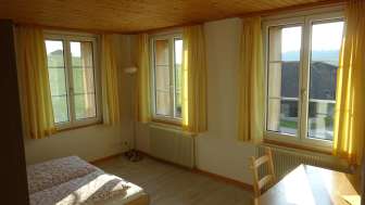 Ferienwohnung Schulhaus Kleinegg Schlafzimmer